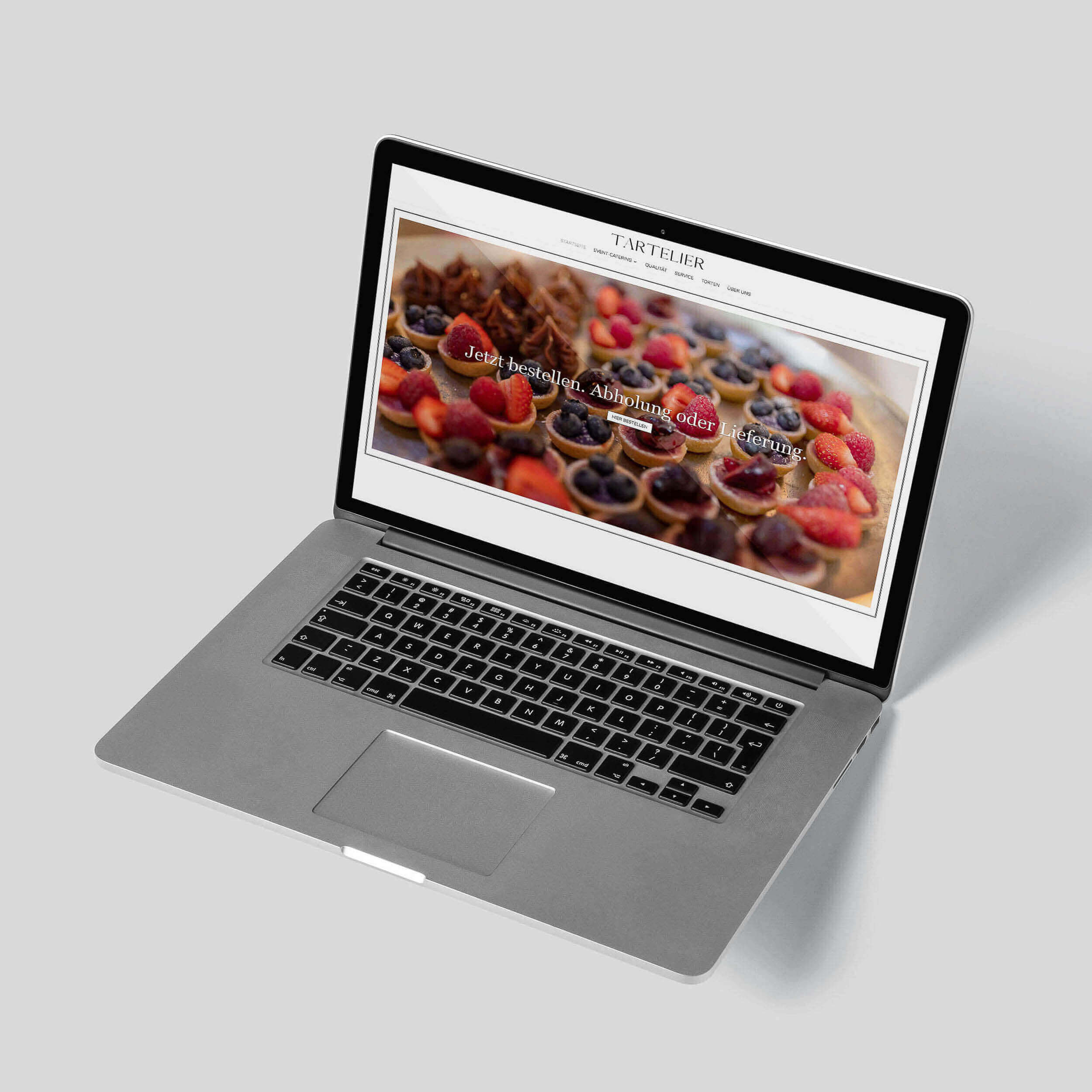 Firmenwebsite von TARTELIER auf einem Laptop