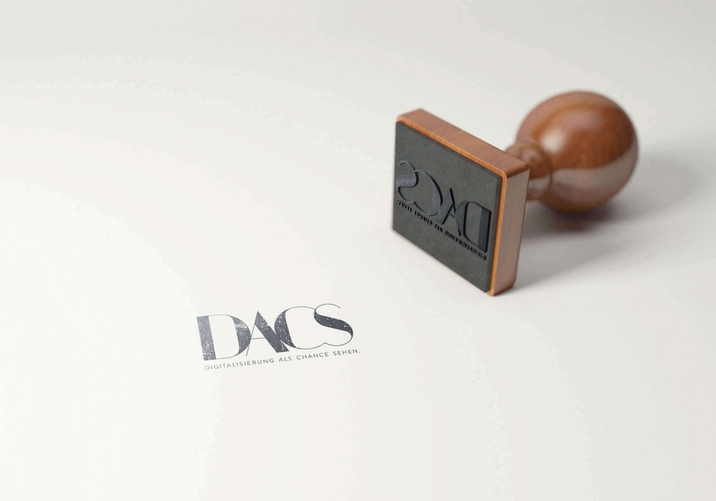 Das Logo von DACS, einer Marke der twr GmbH, als Stempel